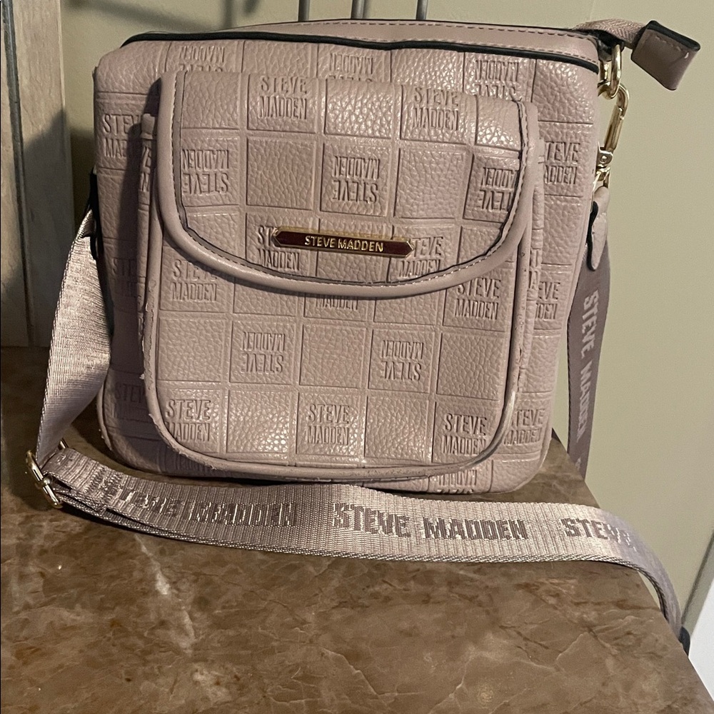 Steve Madden Light Blush Embossed Crossbody Bag. A few nics from using bag.